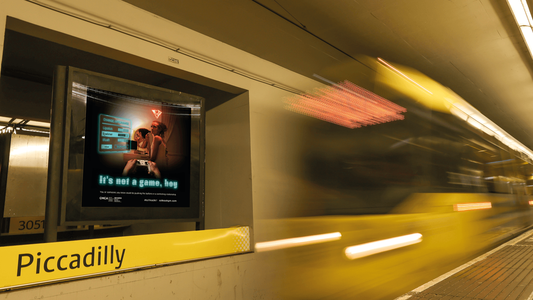 It's not a game, boy campaign shown on a screen in Piccadilly train station